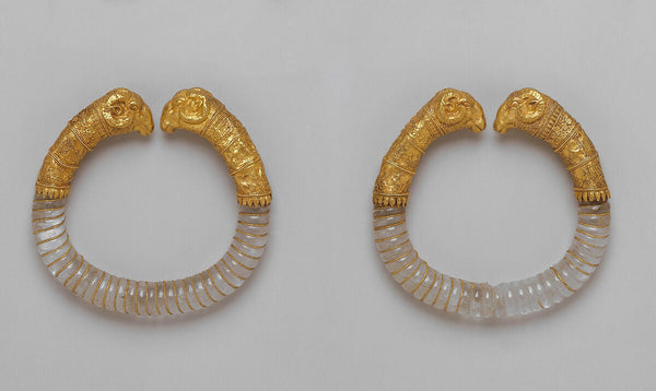 Pair of bracelets with rock crystal hoops and gold rams' heads Greek ca. 330–300 BCE